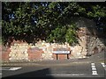 Boundary wall of former works, north corner of Parkway Road and Grange Road, Dudley