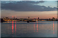 Crane Reflections on The Thames at Sunset