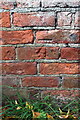 Benchmark on remains of outbuilding at Firby Grange Farm