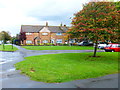 Looking across the southern junction of Woodgreen Avenue and Timsbury Crescent