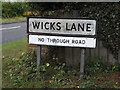 TM0959 : Wicks Lane sign by Geographer