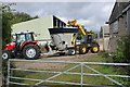 SU7675 : Loading the feed wagon with silage at Sonning Farm by Simon Mortimer