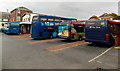 Three buses and a coach in Lymington bus station