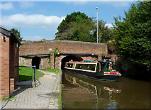 SJ8934 : Narrowboat and canal bridge in Stone, Staffordshire by Roger  D Kidd