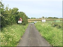 H9562 : Signs approaching the River Bann, Derrylard by Dean Molyneaux