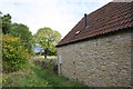 Permissive path passing barn conversion at Manor Farm