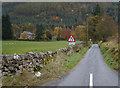 NN8048 : Minor road leading to the village of Dull by Ian S