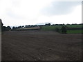 Ploughed land alongside Crooked Road