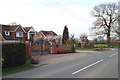 SP0974 : New houses by Forshaw Heath Lane by Robin Stott