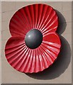 SO6303 : Poppy on a building in Lydney by Philip Halling