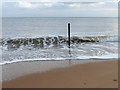 NZ3278 : Post in the sea, Blyth Beach by Oliver Dixon