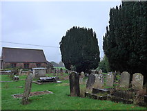 TQ2913 : St John the Baptist, Clayton: a soggy churchyard by Basher Eyre