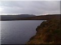 NH1999 : West end of Lochanan nan Sailean Mora above Langwell, Ullapool by ian shiell