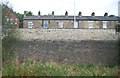 Wall and terraced houses