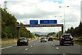 Gantry sign over the M65