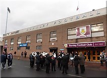 SD8432 : Brass band outside Turf Moor football ground by Neil Theasby