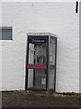 NY3657 : Phone box in Grinsdale by Graham Robson