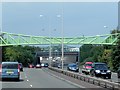SJ9142 : Green Footbridge over Uttoxeter Road at Longton by David Dixon