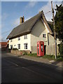 TM1677 : Telephone Box & Cottage by Geographer