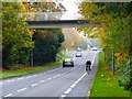 Looking eastwards on Lockfield Drive with footbridge ahead