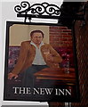 Modern depiction on a name sign, The New Inn, Pershore