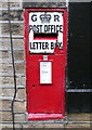 George V post office letter box, High Street, Luddenden