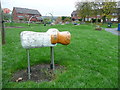 Wooden sheep in the play area at Dodd Naze