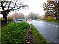 A 3046 enters Chobham at Mim Bridge