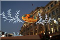 TQ2981 : View of the Regent Street Christmas decorations from Great Marlborough Street #2 by Robert Lamb