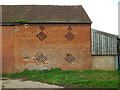 SP0474 : Perforated brickwork in a barn, Broadcroft Farm, by Watery Lane by Robin Stott