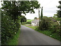 Disused farmstead cottage and buildings at the lower end of Legananny Road