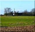 Looking across fields to Rushmere Farm buildings