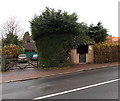 SO5712 : Gated bus shelter in a hedge, Christchurch by Jaggery