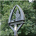 TL9759 : Rattlesden village sign (detail) by Adrian S Pye
