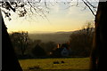 TQ1242 : Looking west out of Leith Hill Wood along the Greensand hills by Christopher Hilton