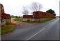 Brook Lane passes the entrance to Brook End Farmhouse