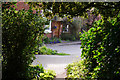 Emerging from a footpath on to Walton Pool Lane, Clent