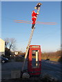 SX0255 : Carluddon: phone box and Santa by Chris Downer
