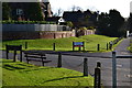 Morning sunlight on grassy bank by Leigh Place