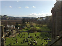 NT5434 : Melrose Abbey: burial ground from roof of south transept by Jonathan Hutchins