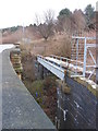 Pipe Bridge over the partially filled railway cutting alongside Dalton Bank Road