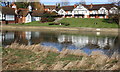 Large house in Burcot seen across The Thames