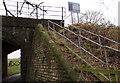 Wooden steps up to Blaisdon Road railway bridge near Westbury-on-Severn