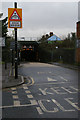 TQ2369 : Low railway bridge over Lower Downs Road by Christopher Hilton