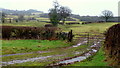 Muddy gateway at Alexanderstone