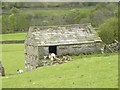 SD9498 : Barn built against hillside at Gunnerside by Gordon Hatton