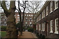 View of flats on Kingsland Road from the Geffrye Museum grounds