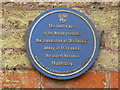 Blue plaque on a house in Bimport