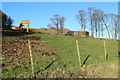 NX1083 : Farmland with Digger at Balnowlart by Billy McCrorie