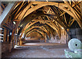 SO7853 : Leigh tithe barn interior by Chris Allen